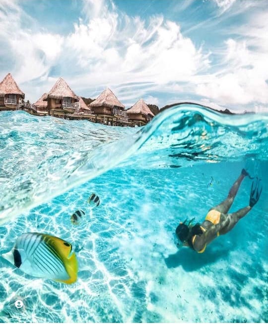 Girl snorkeling in Bora Bora