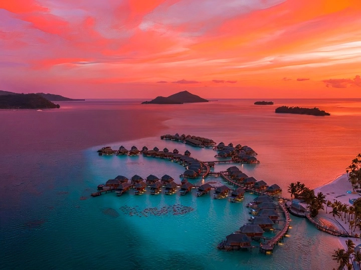 Le Bora Bora by Pearl Beach Resort - Aerial View at sunset