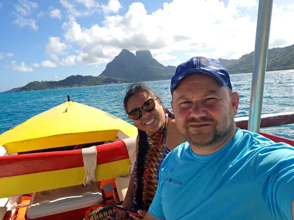 Couple on a boat in Bora Bora