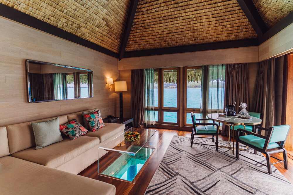 Living room in the Overwater Superior, Overwater Deluxe, and Overwater Deluxe Otemanu, St Régis Bora Bora