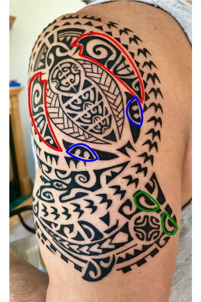 Tahitian tattoo with Tikis tattoo symbol