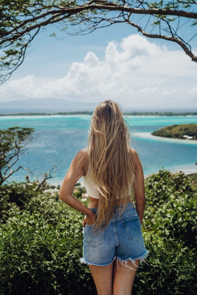 a woman looking at the lagoon in Bora Bora