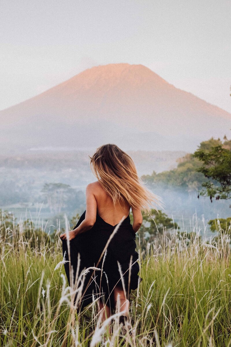 Billie in front of a volcano
